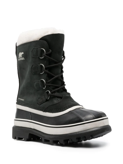Shop Sorel Caribou Lace-up Snow Boots In Black