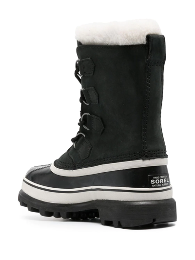 Shop Sorel Caribou Lace-up Snow Boots In Black