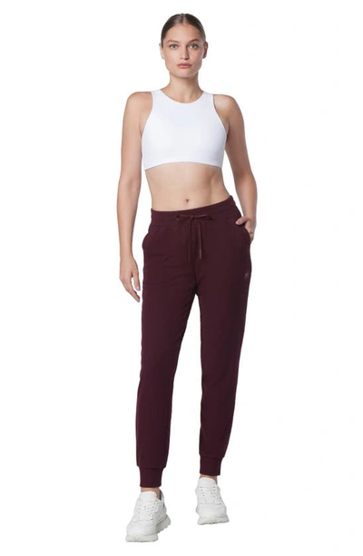 Shop Andrew Marc Sport Long Joggers In Burgundy