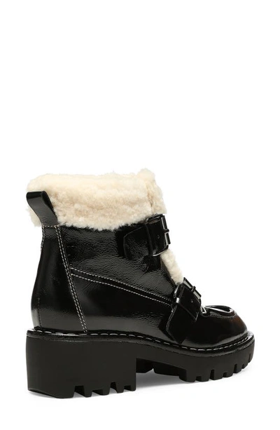 Shop Donald Pliner Elix Genuine Shearling Bootie In Black