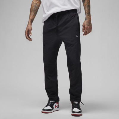 Shop Jordan Men's  Essentials Woven Pants In Black
