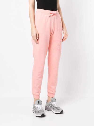Shop Armani Exchange Graphic Print Cuffed Track Pants In Rosa