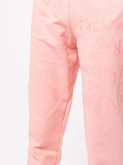 Shop Armani Exchange Graphic Print Cuffed Track Pants In Rosa