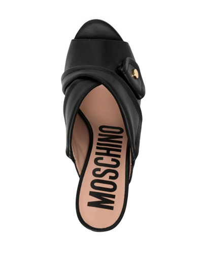 Shop Moschino Heeled Leather Mules In Schwarz