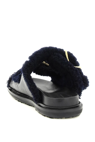Shop Marni Leather And Shearling Fussbett Slides In Black,blue