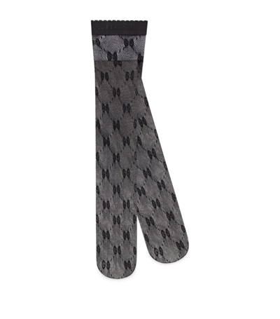 Shop Gucci Gg Metallic Knit Tights In Black