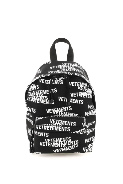 Shop Vetements Logo Print Mini Backpack In Black (black)