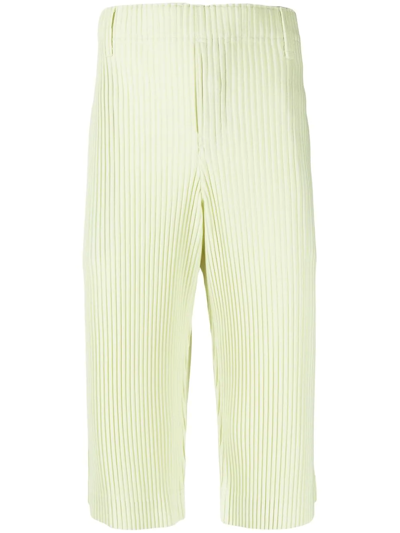 Shop Issey Miyake Tailored Pleated Shorts In Yellow