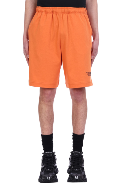 Shop Vetements Shorts In Orange Cotton