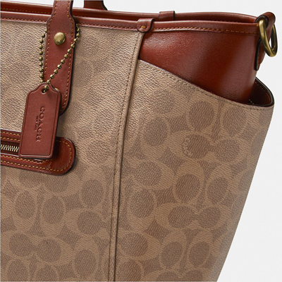 Shop Coach Baby Bag In Signature Canvas In Brass/tan/rust