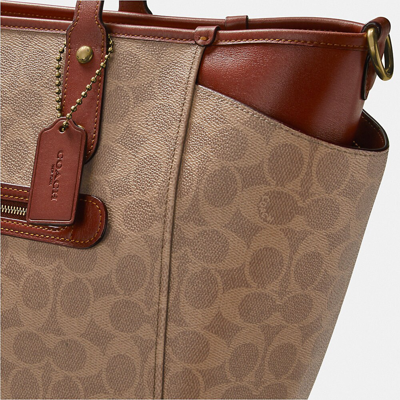 Coach Baby Bag In Signature Canvas In Brass tan rust ModeSens