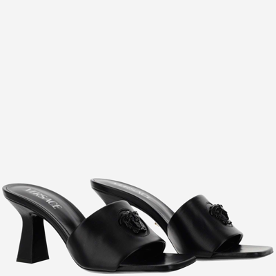 Shop Versace Sandals In Nero