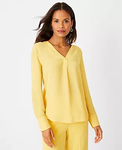 Shop Ann Taylor Mixed Media Pleat Front Top In Desert Yellow