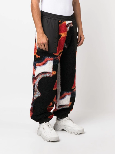 Ambush Printed Panelled Faux Shearling Sweatpants In Schwarz