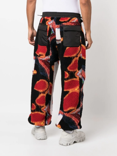 Ambush Printed Panelled Faux Shearling Sweatpants In Schwarz