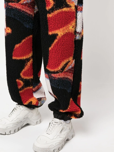 Ambush Printed Panelled Faux Shearling Sweatpants In Schwarz