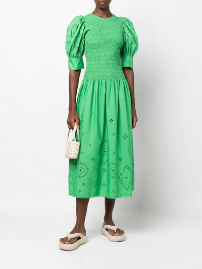Shop Ganni Broderie-anglaise Smocked Dress In Green