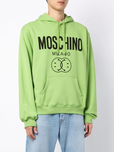 Shop Moschino Logo-print Drawstring Hoodie In Grün