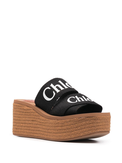 Shop Chloé Woody Canvas Wedge Mules