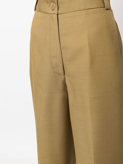 Shop Khaite Ian Wide-leg Trousers In Brown