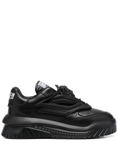 Shop Versace Leather Sneaker In Black
