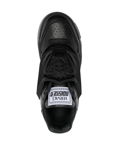 Shop Versace Leather Sneaker In Black