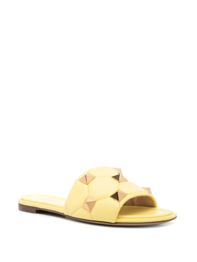 Shop Valentino Roman Stud Leather Flat Sandals In Yellow
