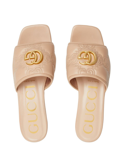 Shop Gucci Gg Matelassã© Leather Slide Sandals In Beige