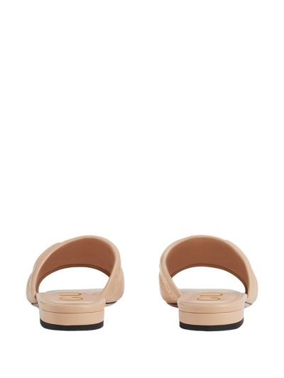 Shop Gucci Gg Matelassã© Leather Slide Sandals In Beige