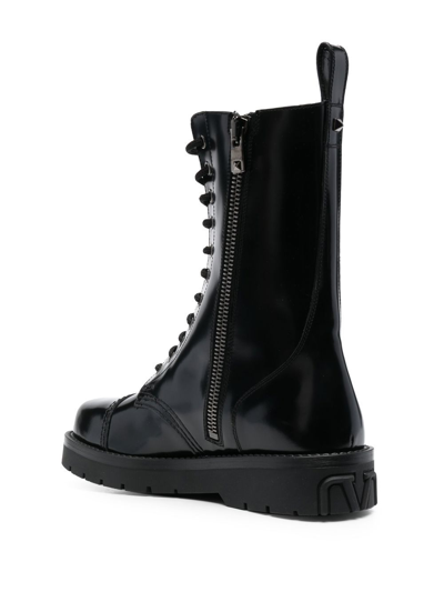 Shop Valentino Combat Boot In Black