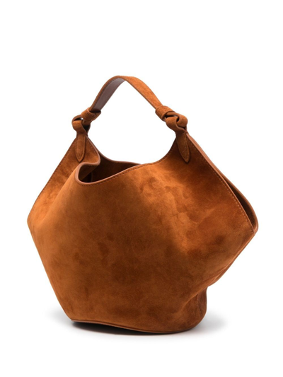 Shop Khaite Lotus Mini Leather Handbag In Brown