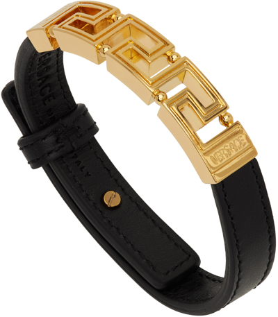 Shop Versace Black & Gold Greek Key Bracelet In 1b00v Nero-oro Versa