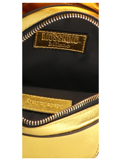 Shop Moschino Mirror Clutch In Gold