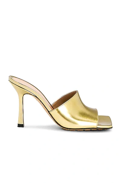 Shop Bottega Veneta Stretch Mule Sandals In Gold