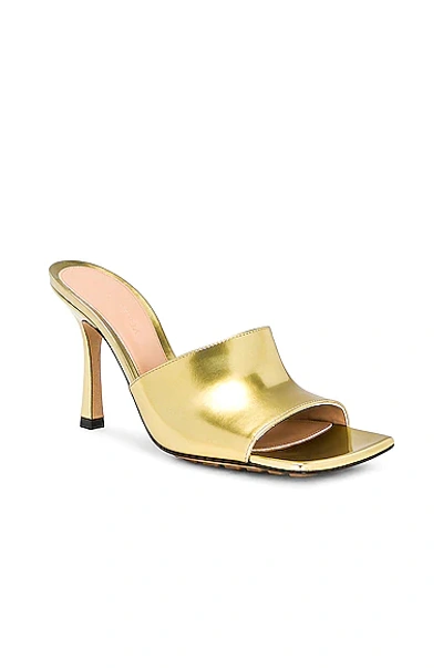 Shop Bottega Veneta Stretch Mule Sandals In Gold