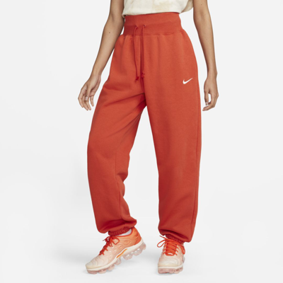 Shop Nike Women's  Sportswear Phoenix Fleece High-waisted Oversized Sweatpants In Orange