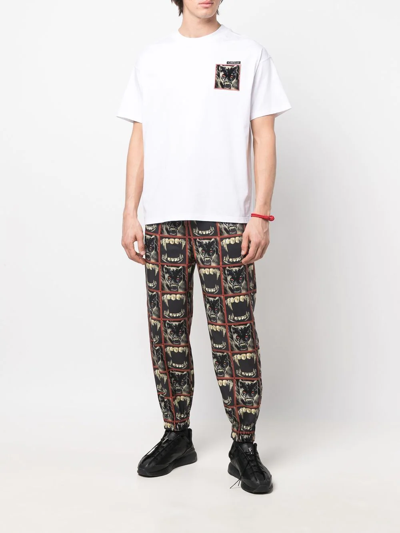 Roberto Cavalli Panther Print Track Pants In Black