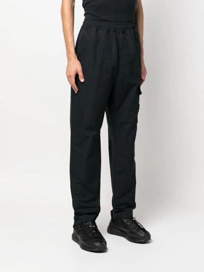 Shop Stone Island Compass-patch Cargo Trousers In Schwarz