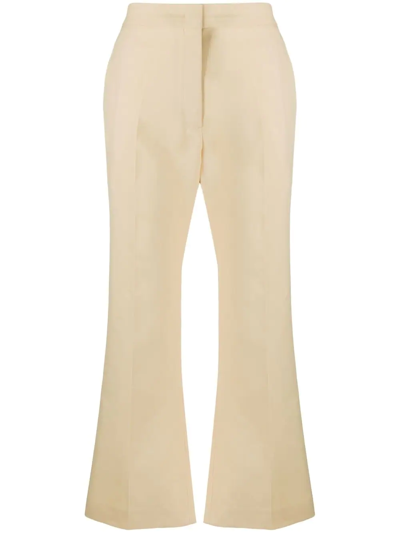 Shop Jil Sander High-waisted Flared Trousers In Nude