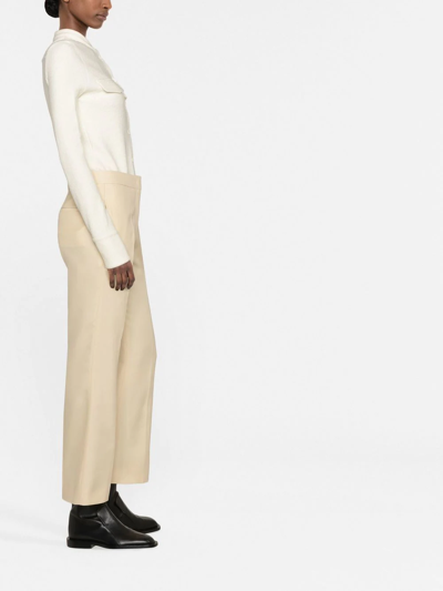 Shop Jil Sander High-waisted Flared Trousers In Nude