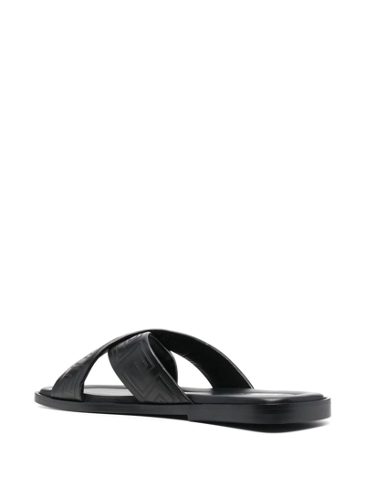 Shop Versace Greca-embossed Crossover-strap Sandals In Black