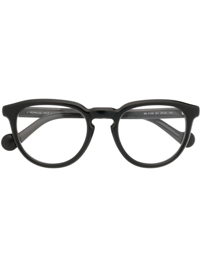 Shop Moncler Round Frame Glasses In Schwarz