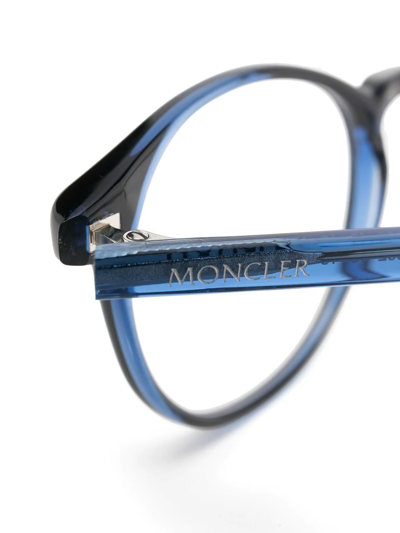 Shop Moncler Round Frame Glasses In Schwarz