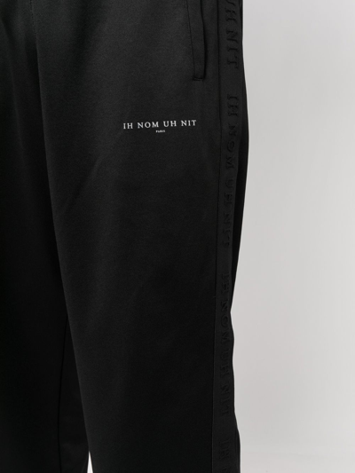 Shop Ih Nom Uh Nit Logo-print Track Trousers In Schwarz
