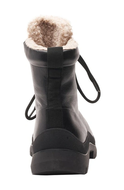 Shop Andre Assous Leandra Faux Shearling Weather Resistant Bootie In Black