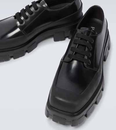 Prada Paneled Leather Derby Shoes In Black