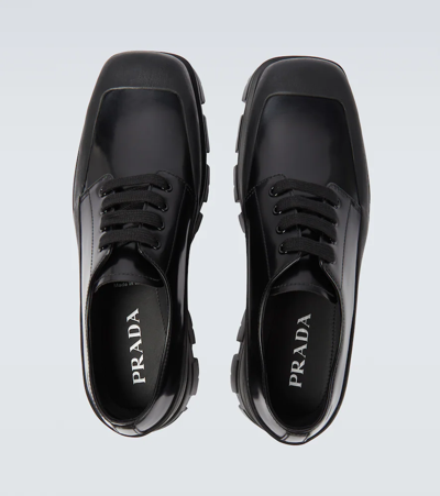 Prada Paneled Leather Derby Shoes In Black