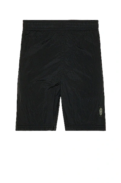 Shop Stone Island Swim Trunks In Black