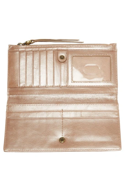 Shop Hobo Donner Leather Zip Wallet In Cameo