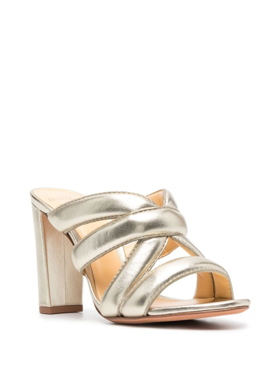 Shop Alexandre Birman 100mm Crossover Leather Mules In Gelb
